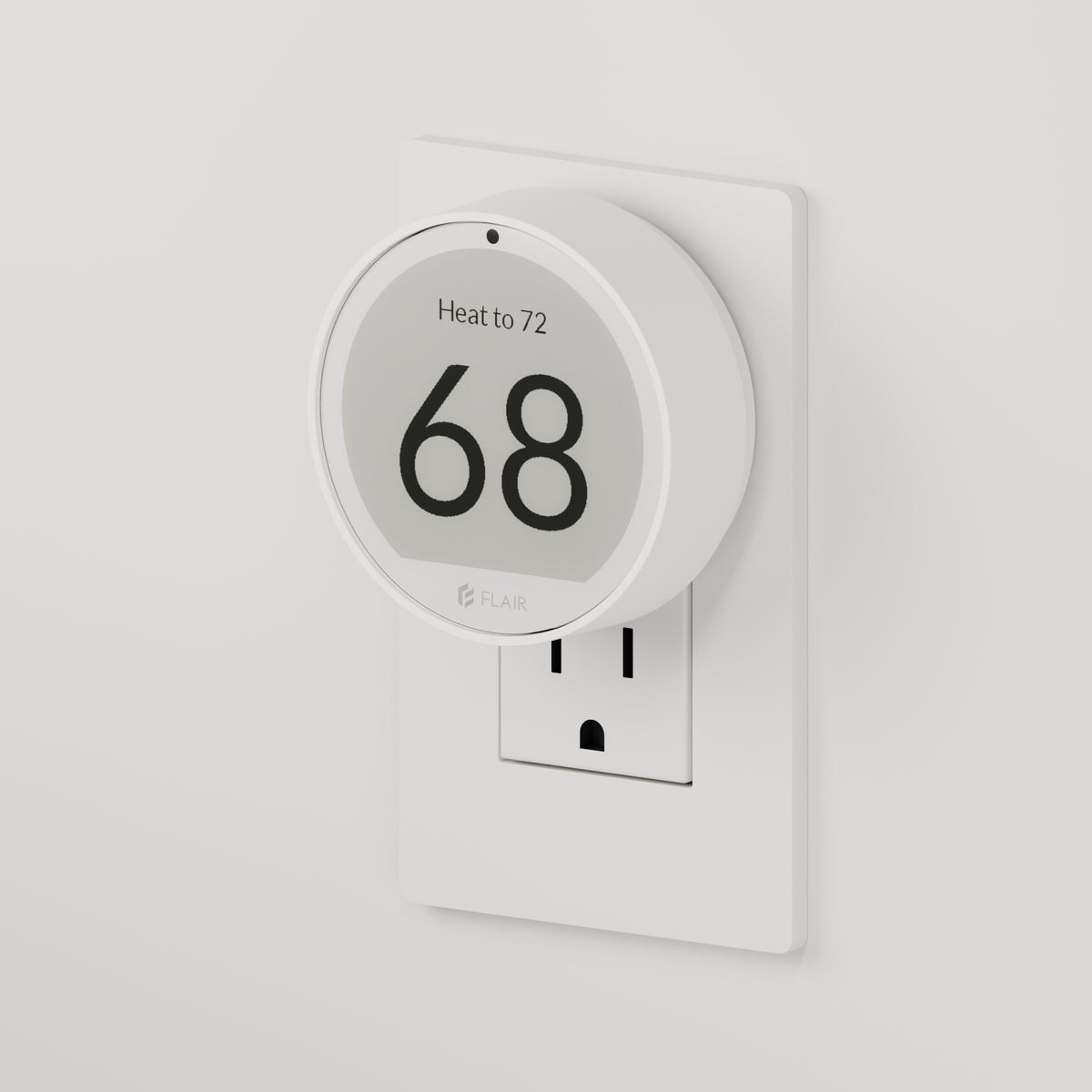 Puck 2 mounted on a wall outlet with the USB-C Mount