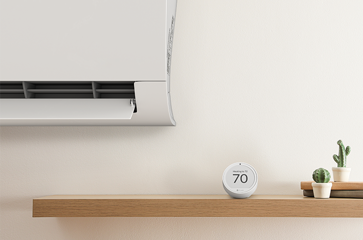 Flair Puck 2 on shelf next to mini split