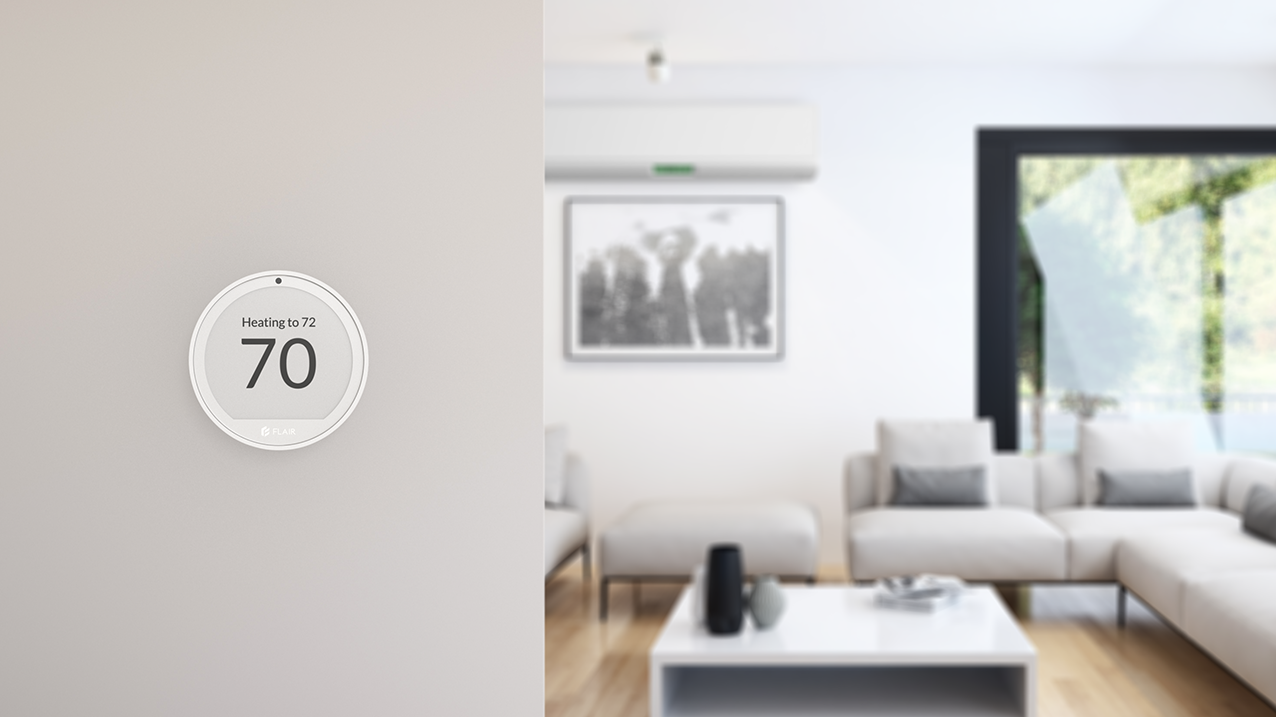 Flair Puck 2 on wall with mini split in background